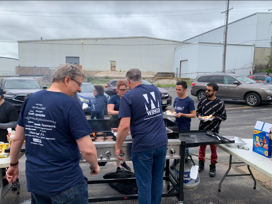 Winco employees enjoying a Memorial Day cookout in the parking lot